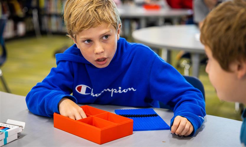Students use robots in library
